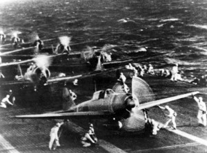 Japanese naval aircraft prepare to take off from an aircraft carrier (reportedly the Shokaku) 